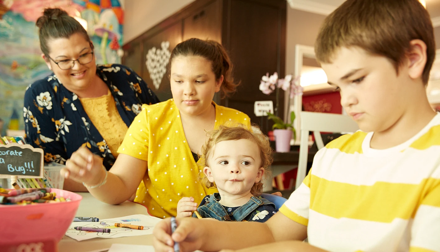 The Kelly family doing with arts and crafts